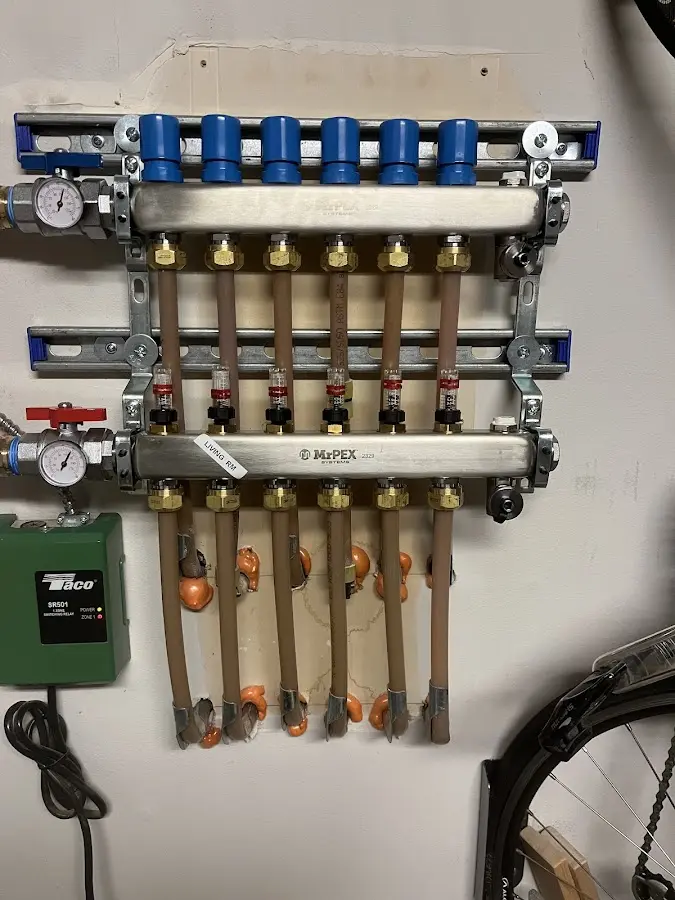 Plumber performing Water Heater Repair at a residential property in Upper Salford